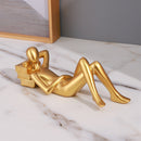 Escultura Lendo Deitada